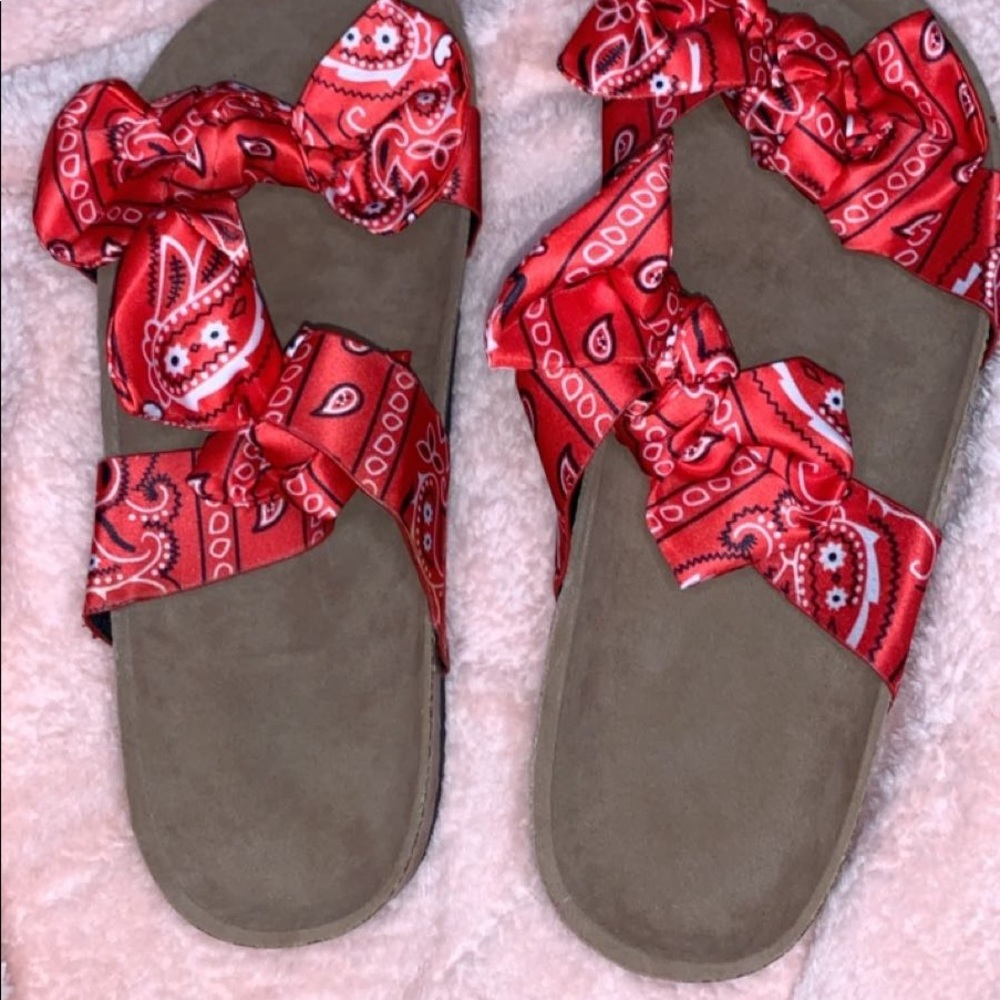 This is a red bandanna slide size 41( USA size 9)
